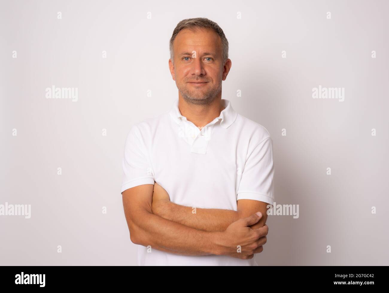 Handsome men crossed arms hi-res stock photography and images - Alamy