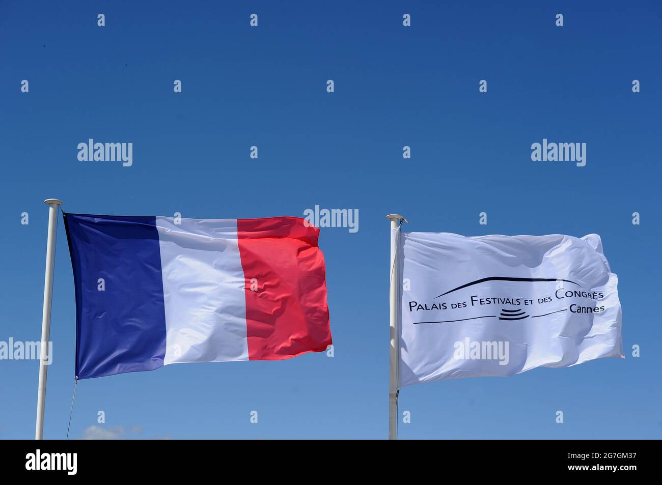 Cannes, France. 13th July, 2021. A flag of the France and a flag of the