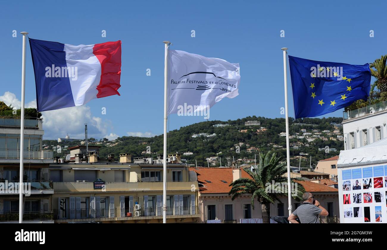 Cannes, France. 13th July, 2021. A flag of the France, a flag of the