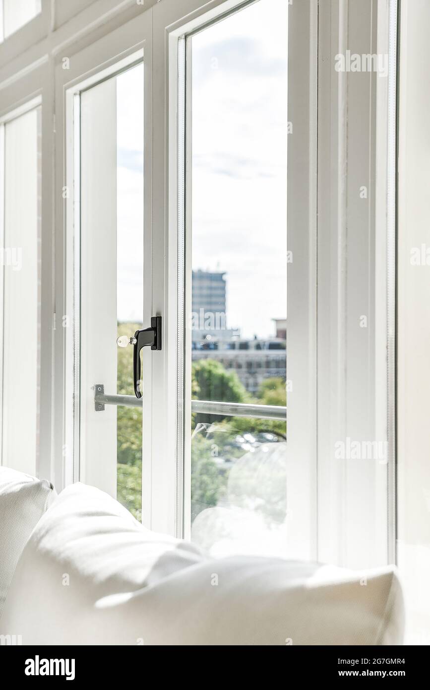 Side view of a window of a modern house with white colors and very ...