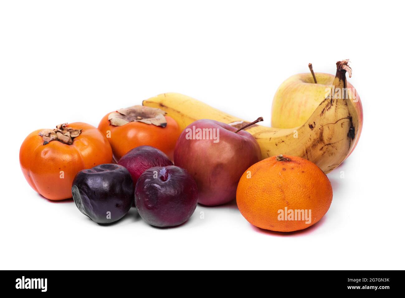 Set of different rotten fruits isolated on white background Stock Photo