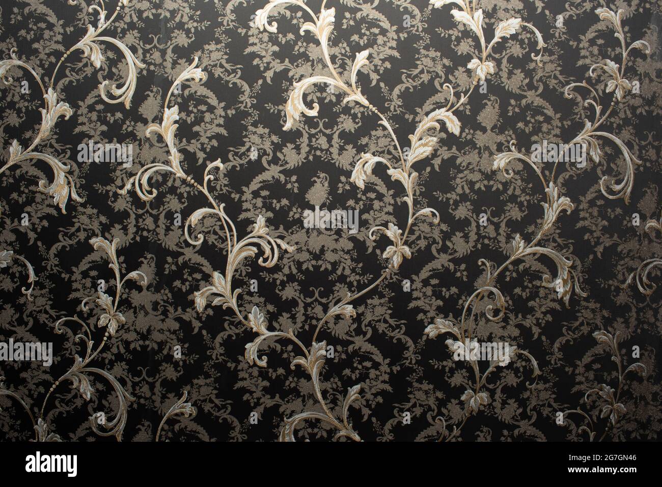 Golden floral pattern on the black background Stock Photo - Alamy