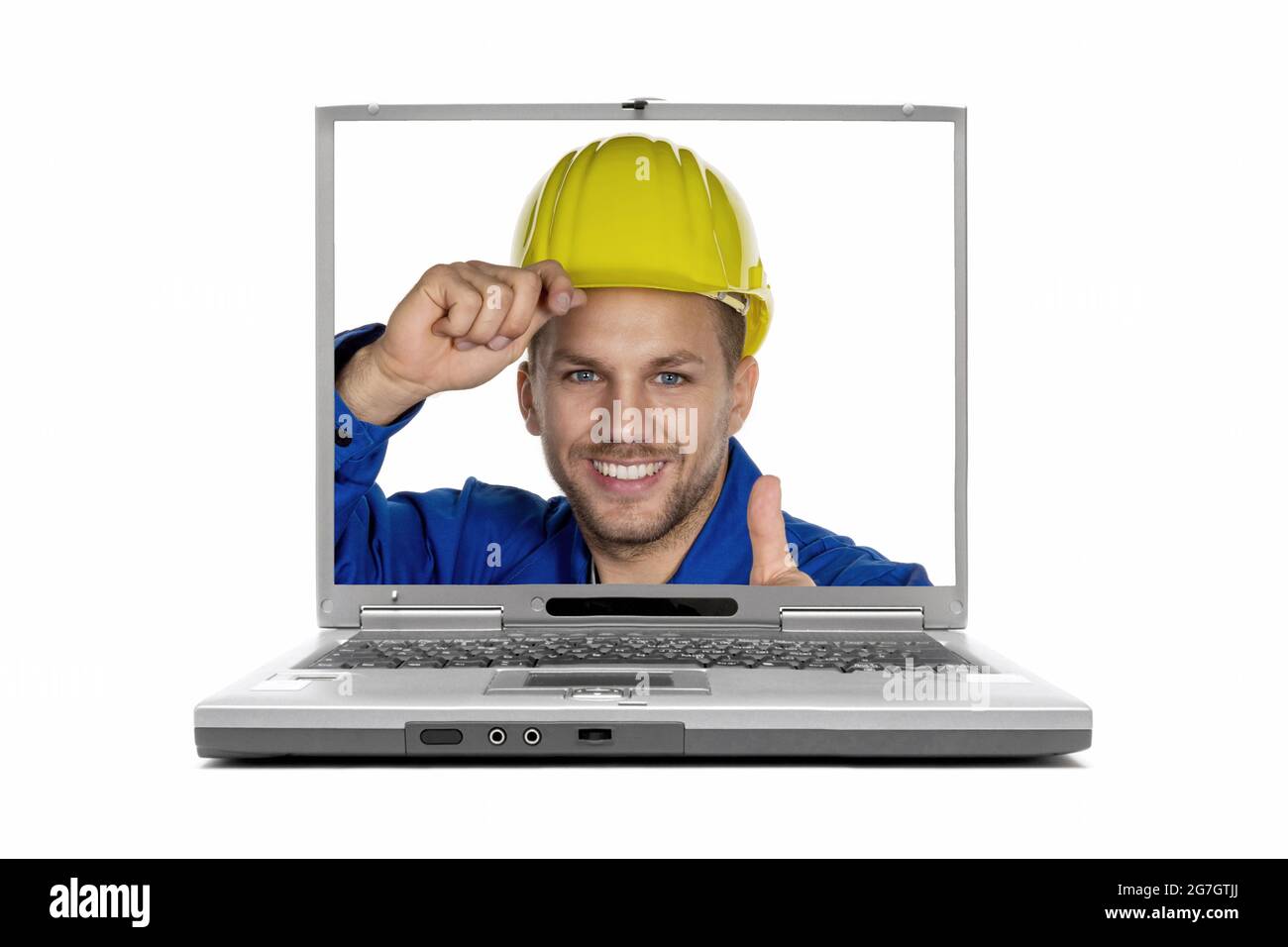 worker with hardhat on the display of a laptop Stock Photo