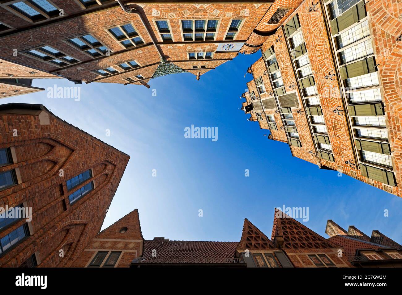 look up to Ludwig Roselius Museum, Glockenspiel House and St Petrus House in Boettcherstrasse, brick building , Germany, Bremen Stock Photo