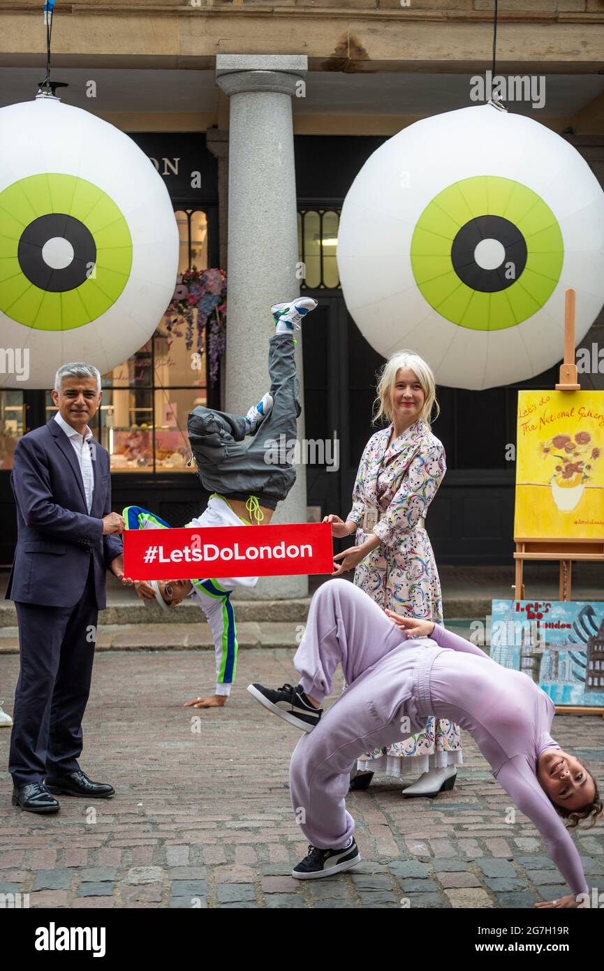 London, UK.  14 July 2021.  Sadiq Khan, Mayor of London, and Justine Simons, Deputy Mayor for Culture and the Creative Industries, at a photocall in Covent Garden for the launch of “Let’s Do London”, a campaign being promoted to highlight London’s family attractions and activities as the capital (and rest of the UK) comes out of lockdown restrictions on 19 July.  Credit: Stephen Chung / Alamy Live News Stock Photo