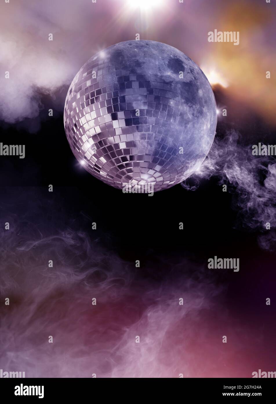Halloween theme moon disco mirror ball with smoke, on dark background Stock Photo