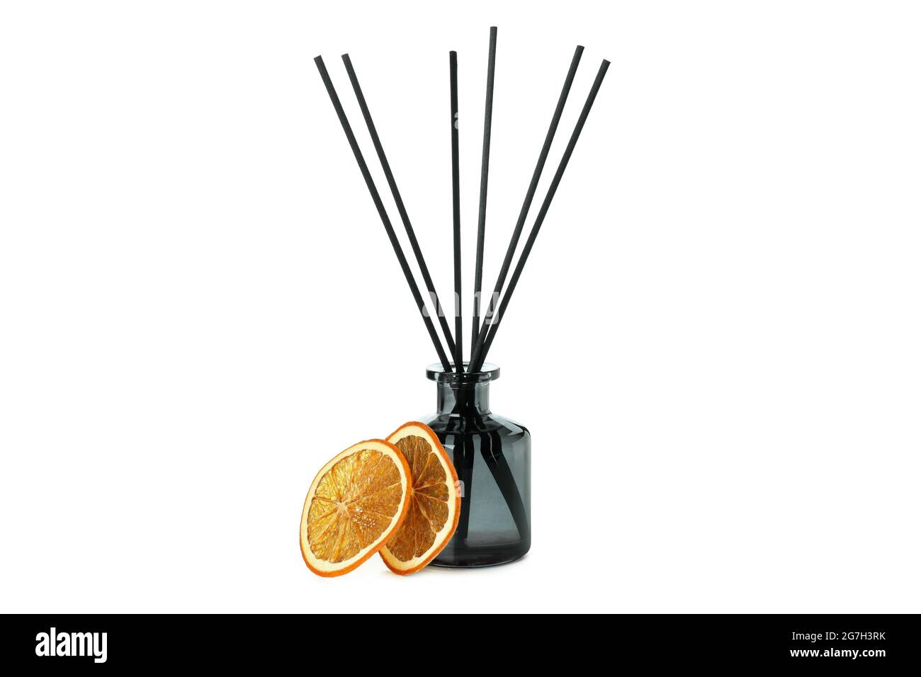 Diffuser bottle with sticks and orange slices isolated on white background Stock Photo