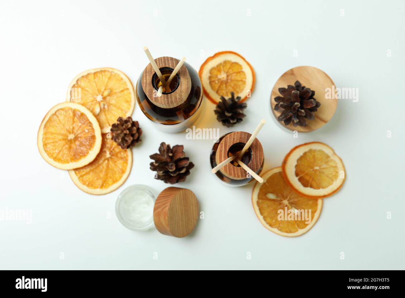 Diffusers, lemons and cones on white background Stock Photo