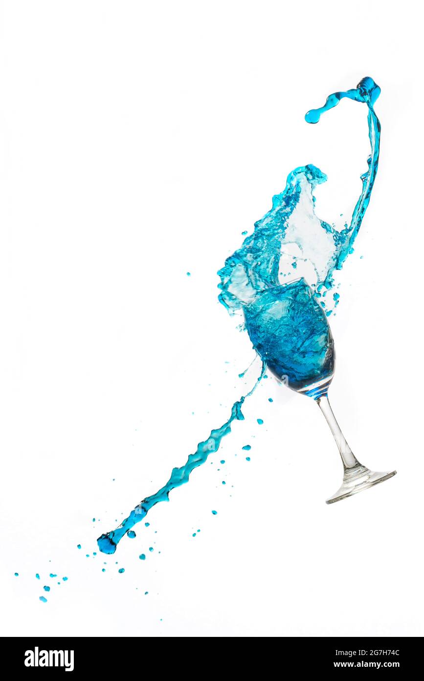 Wine glass on white background whit a blue water splash. Stock Photo