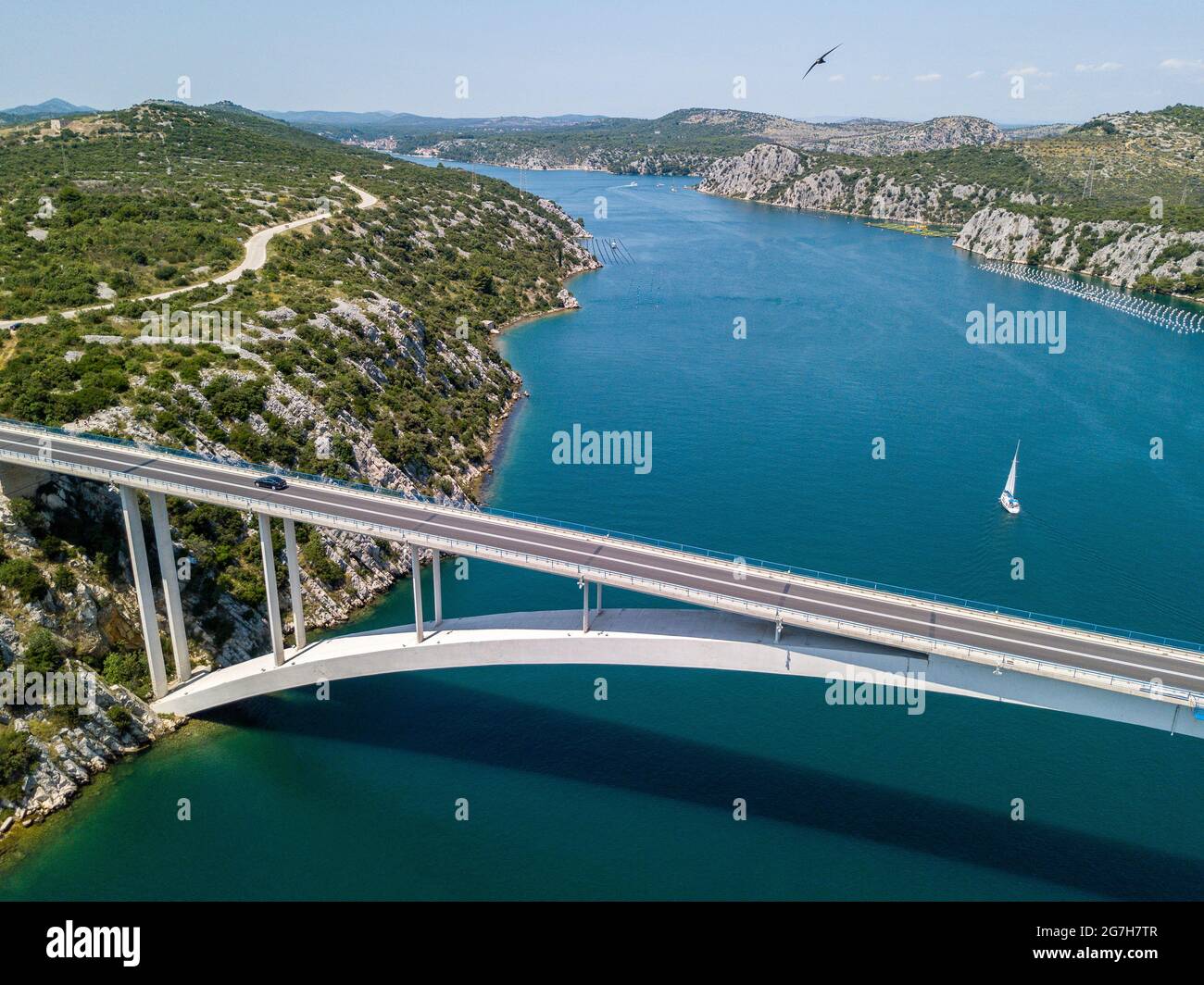 Aerial view of Sibenski Most, croatian bridge. Road and cars. Sibenski, Croatia. Central Dalmatia, where the river Krka flows into the Adriatic Sea Stock Photo