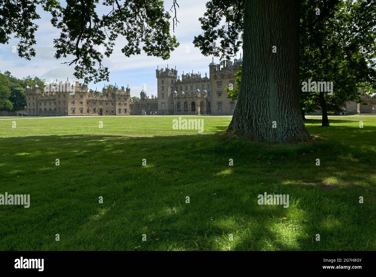 The approach to Floors Castle, a stately home near Kelso in the Scottish Borders. Stock Photo