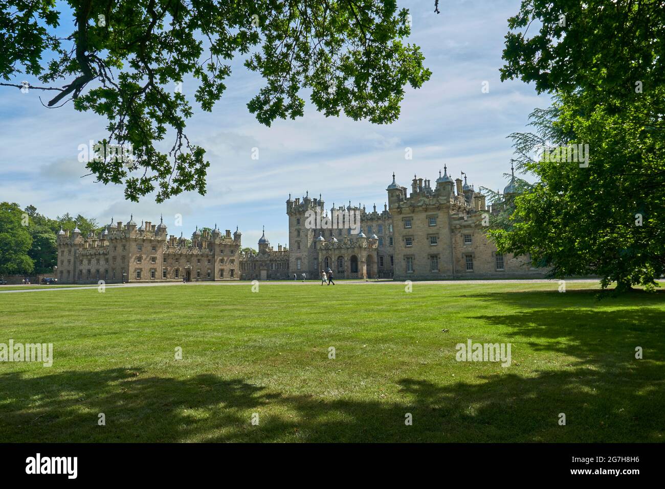 The approach to Floors Castle, a stately home near Kelso in the Scottish Borders. Stock Photo