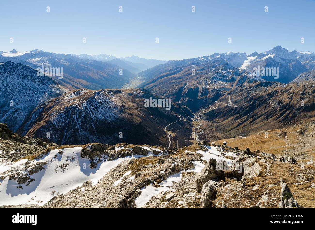 Alpine mountain landscape along the iconic Furkapass and Grimselpass road and the village Gletsch in the canton Wallis, Swiss Alps, Switzerland Stock Photo