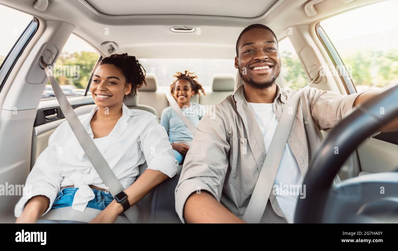 Happy African American Family Riding Car Traveling By Automobile. Black ...