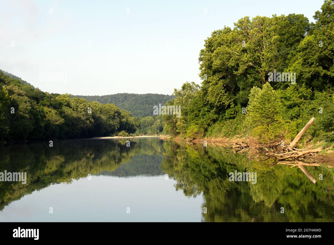Landscape view along the Buffalo river with the trees reflected in the calm water Stock Photo
