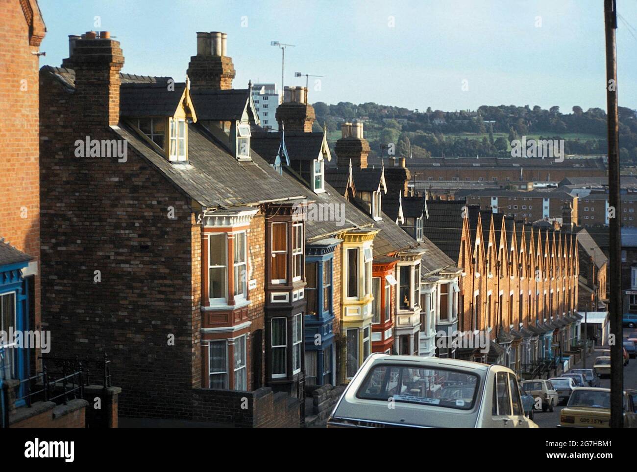 Looking down a street of old Victorian terrace houses on the hill. a Film photograph from the 1980s Stock Photo