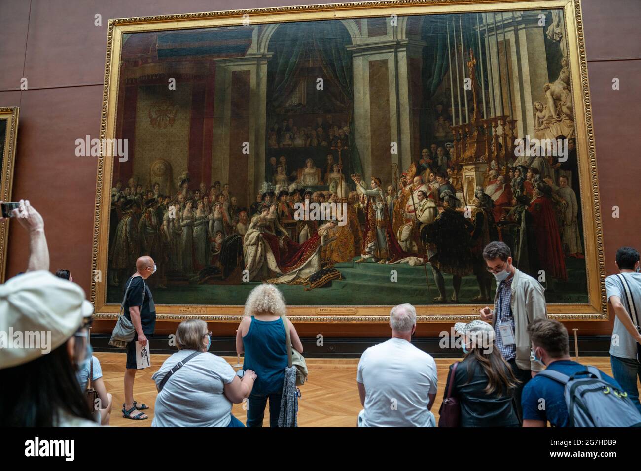 Random people and visitors at the museum of Louvre in Paris Stock Photo