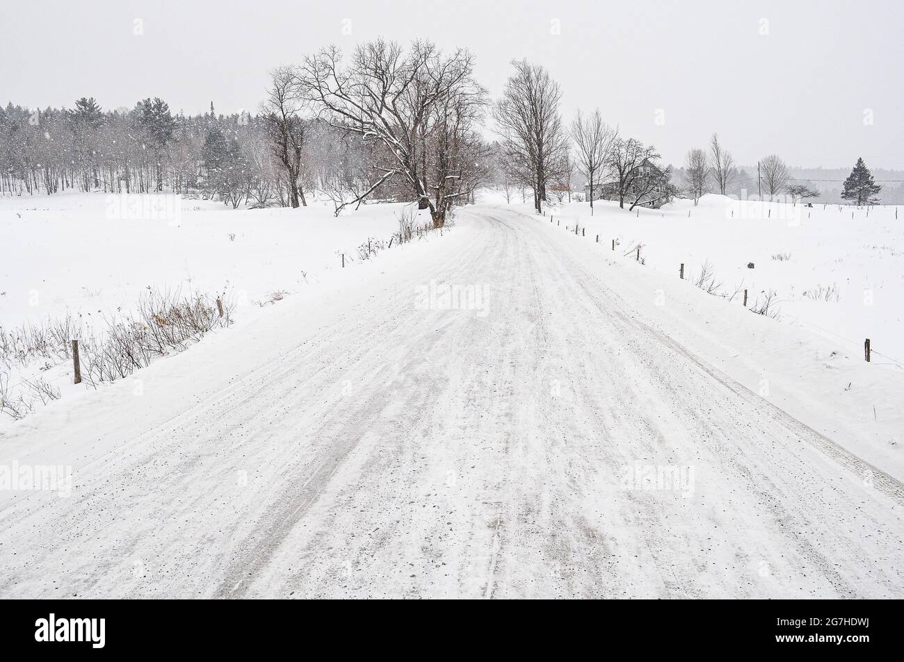 Snowy, rural road in East Montpelier, Vermont, USA. Stock Photo
