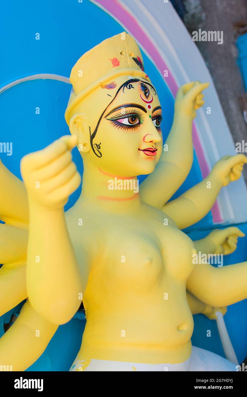 KOLKATA, WEST BENGAL, INDIA - 25 SEPTEMBER 2016: Clay idol of Goddess Durga's face, under preparation for 'Durga Puja' festival in Kumartuli, Kolkata. Stock Photo