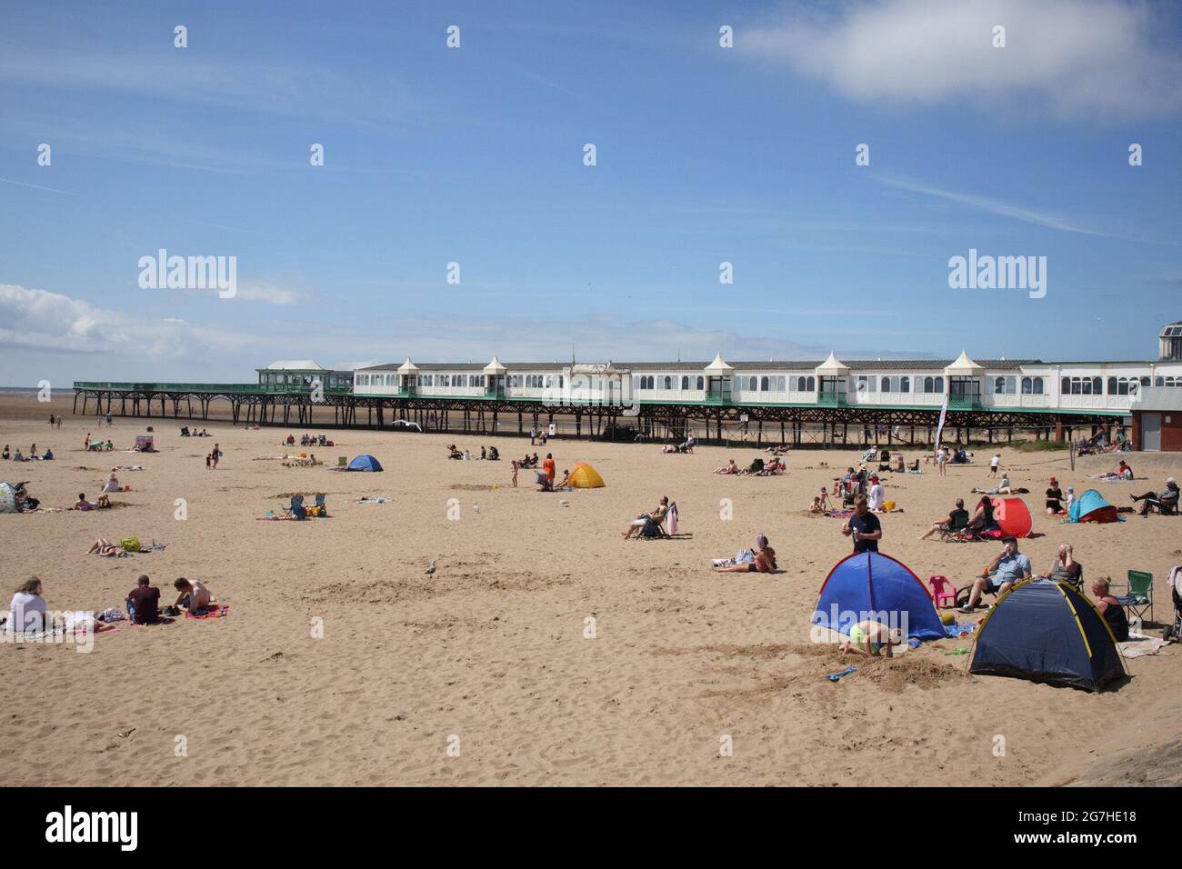 St Anne's On Sea, Lancashire, United Kingdom. 14th July, 2021. Visitors enjoying Midweek on sands at the start of the predicted heatwave Credit: PN News/Alamy Live News Stock Photo