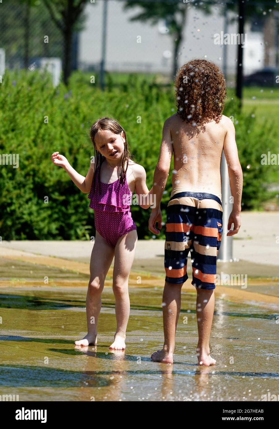 playing in water games and fountains in Quebec City, Canada Stock Photo