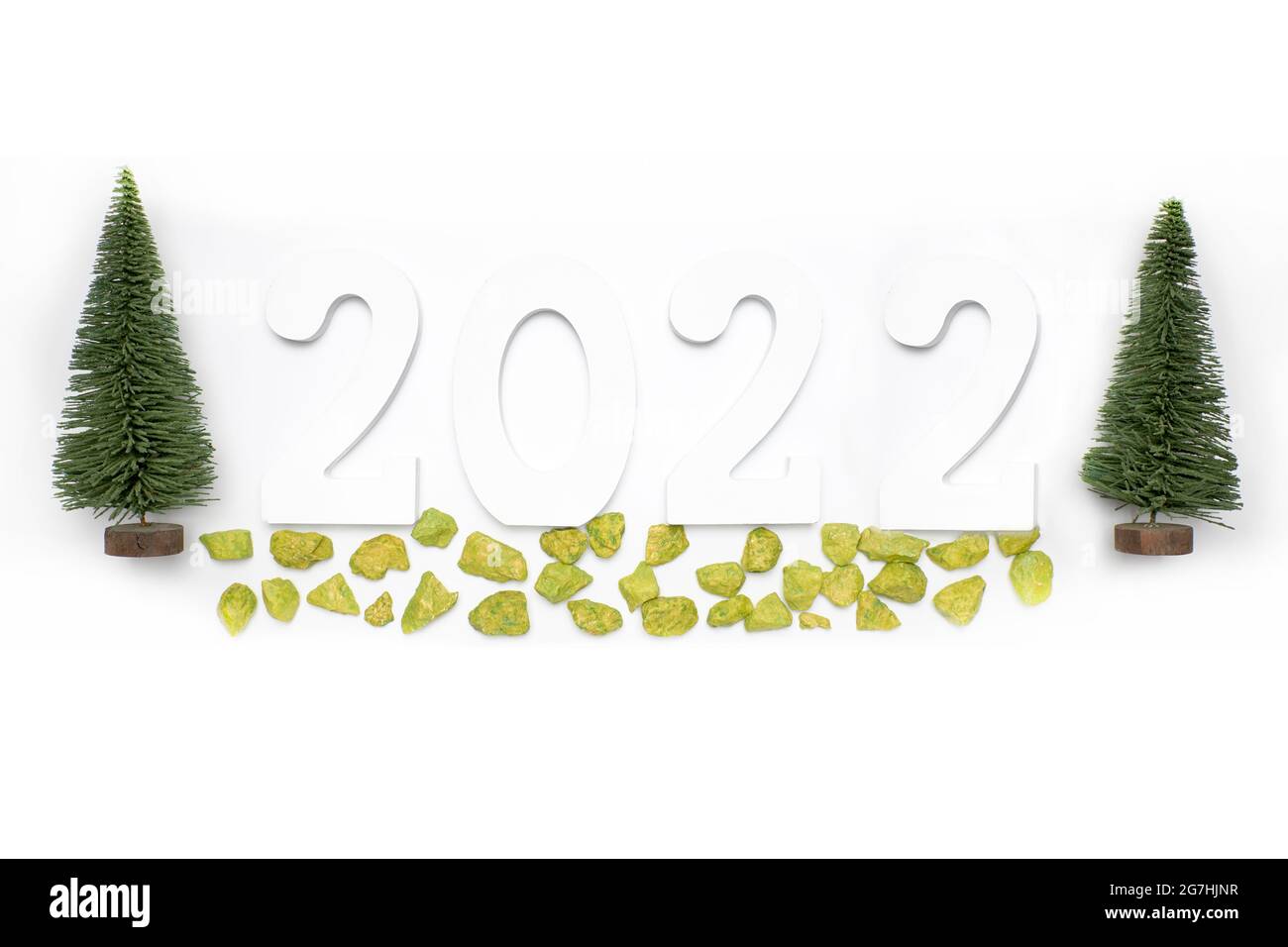 Country Pines Tn Christmas Photos 2022 Two Pine Trees On The Sides Of The Wooden Number 2022 On A White  Background. New Year And Christmas Celebration Concept Stock Photo - Alamy