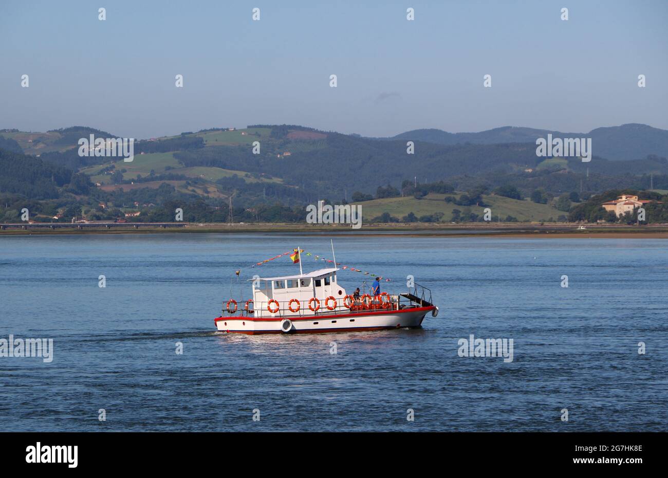 The Santona - Laredo ferry at sea Santona Cantabria Spain on a sunny June morning with few passengers Stock Photo