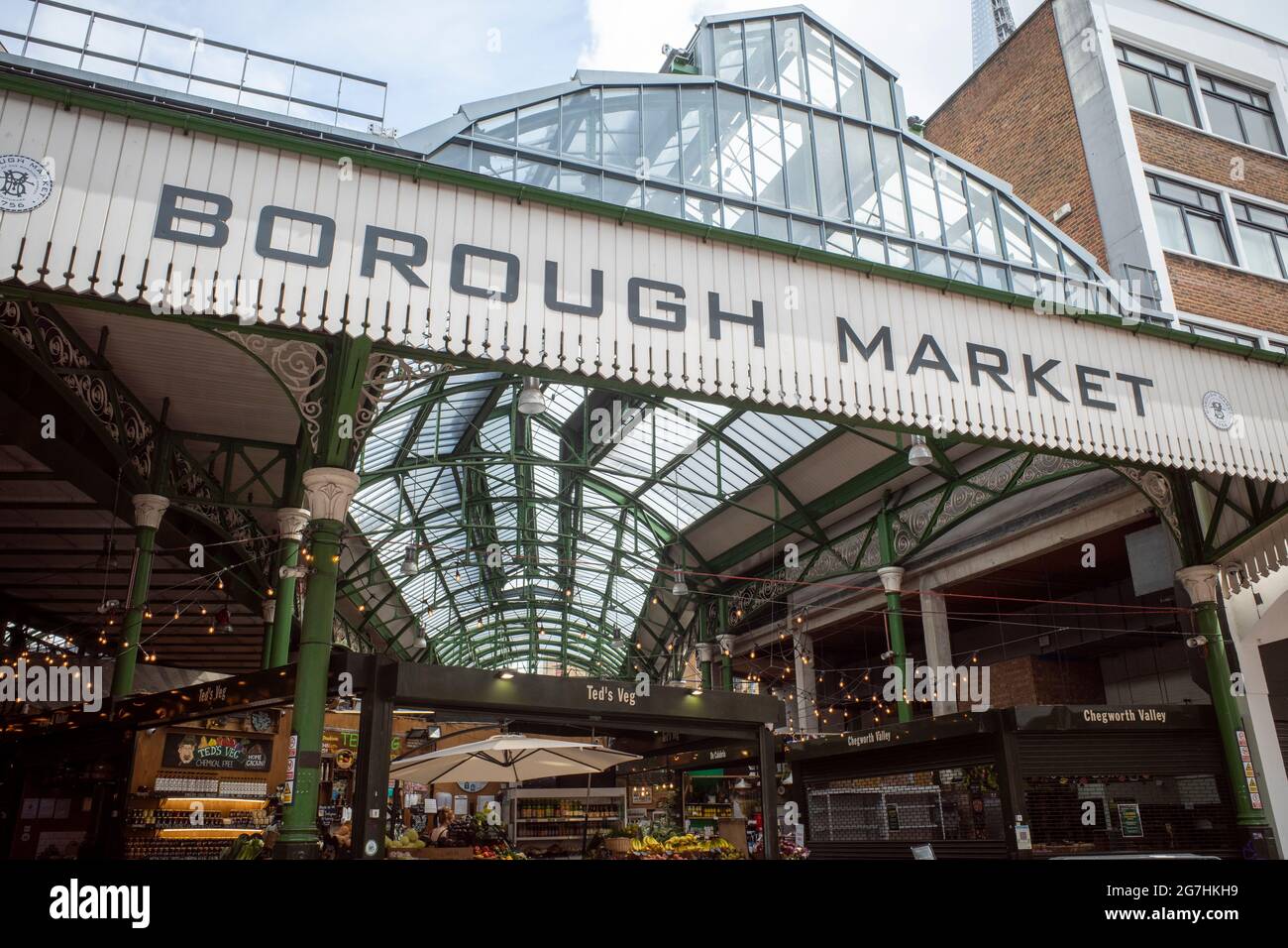 Entrance to Borough Market a traditional covered market of food and drink stalls, restaurants and boutiques, a popular tourist location in Southwark Stock Photo