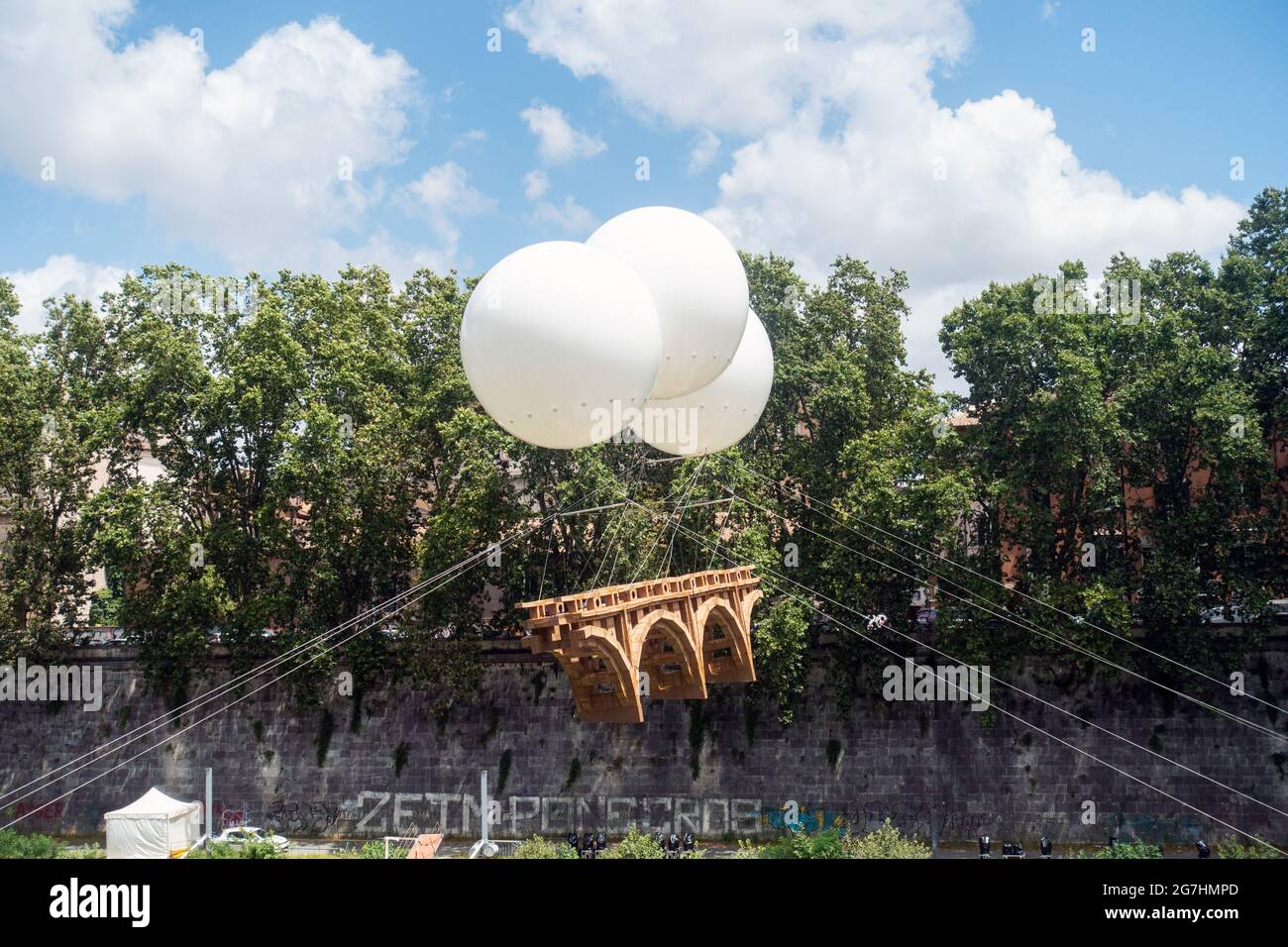 Olivier Grossetete, Suspended Bridge, a temporary  art installation over the Tiber River in Rome, all made of paper Stock Photo