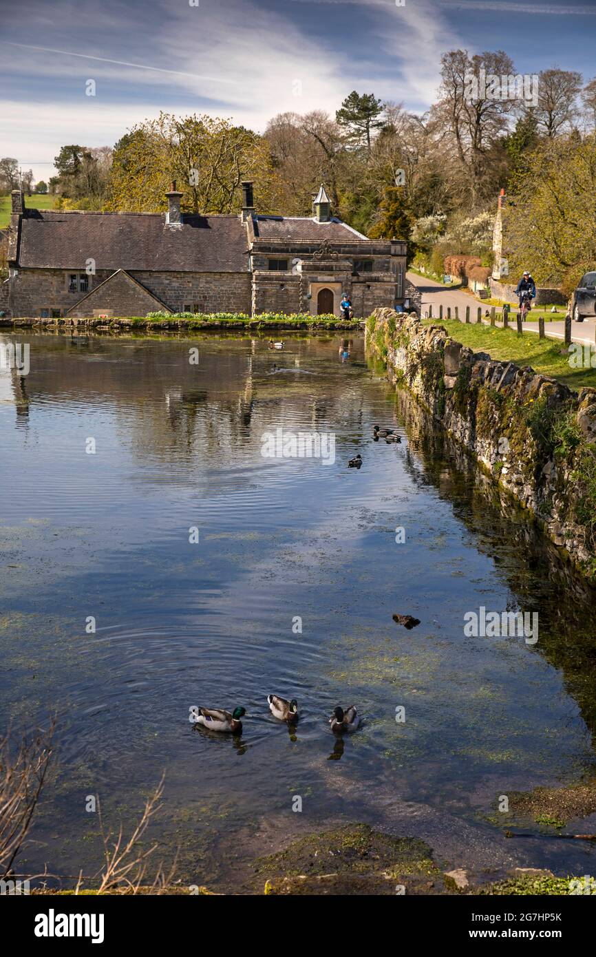 UK, England, Derbyshire, Tissington, Kindergarten in The Old School, across village pond Stock Photo
