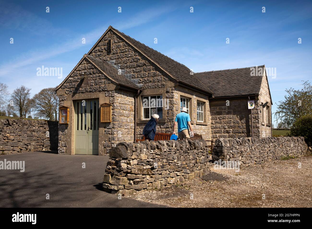 UK, England, Derbyshire, Tissington, Chapel Lane, visitors at village Methodist Chapel Stock Photo