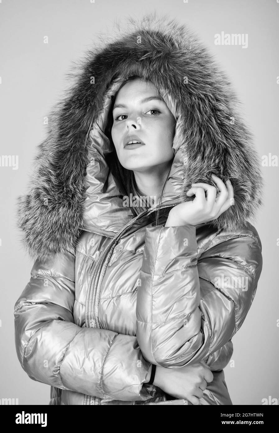 Faux fur. Warming up. Casual winter jacket slightly more stylish and have more comfort features such as larger hood fur trim on hood. Fashion girl win Stock Photo
