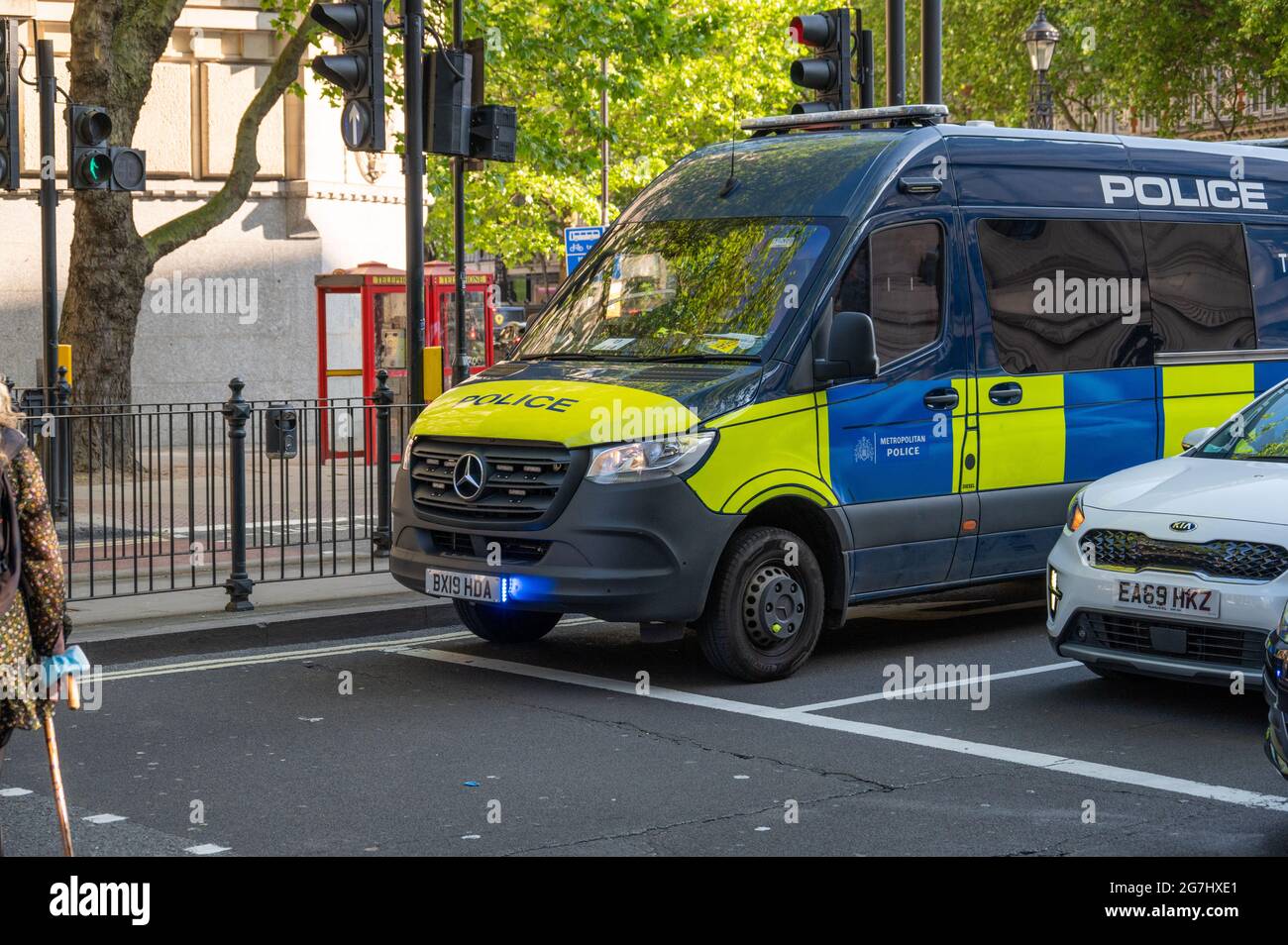 LONDON MAY 29, 2021 Police van with blue flashing lights on a London