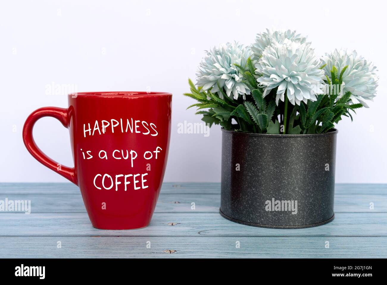 Happiness is a cup of coffee Inspirational Quotes on Coffee Mug Stock Photo  - Alamy