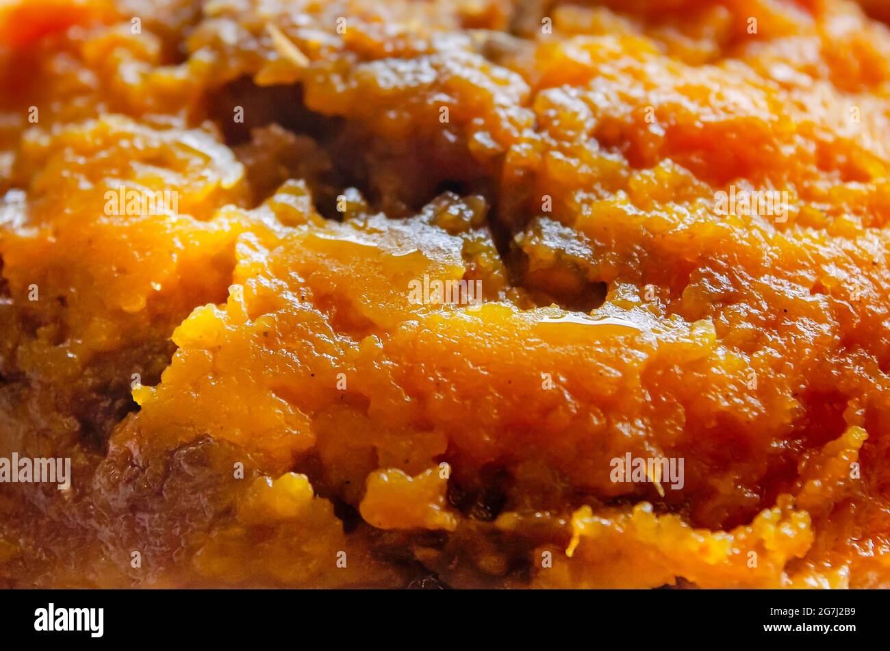 Sweet potato casserole is served at The Shed Barbeque and Blues Joint, July 4, 2021, in Ocean Springs, Mississippi. Stock Photo