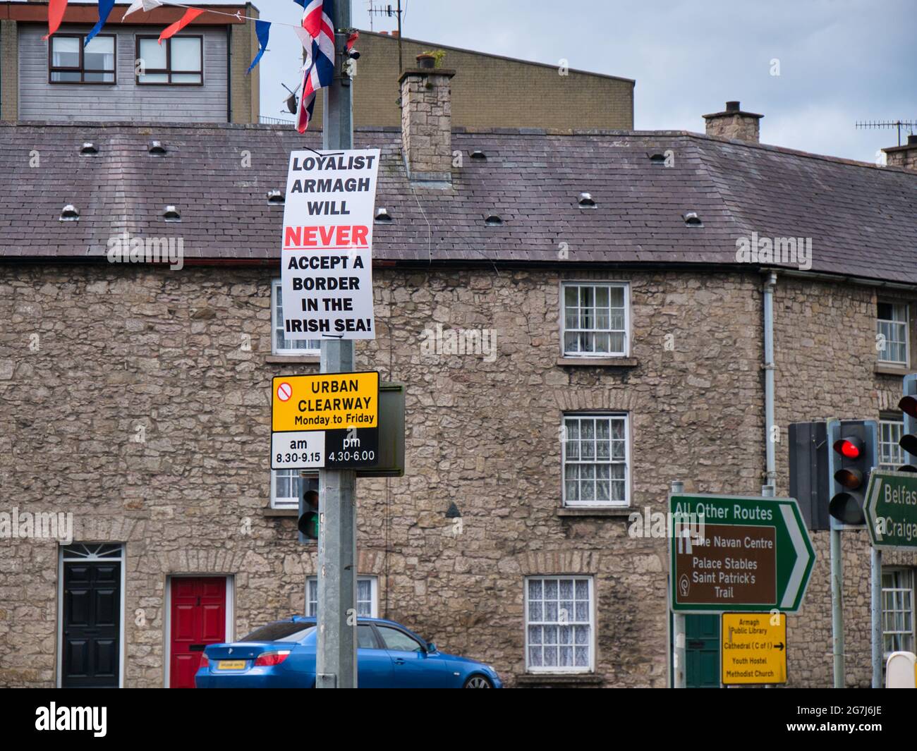 A sign fixed to a lamp post gives the message that the Loyalist people of Armagh do not accept the Northern Ireland Protocol, part of the UK Brexit pr Stock Photo