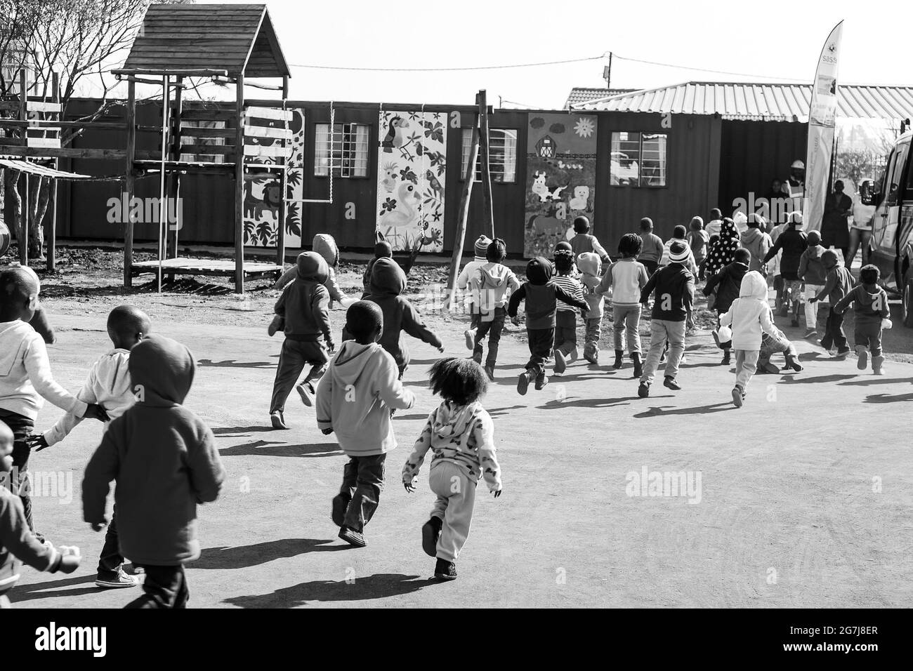 JOHANNESBURG, SOUTH AFRICA - Jan 05, 2021: Soweto, South Africa - July 18, 2016- Young African Preschool kids playing in the playground of a kindergar Stock Photo