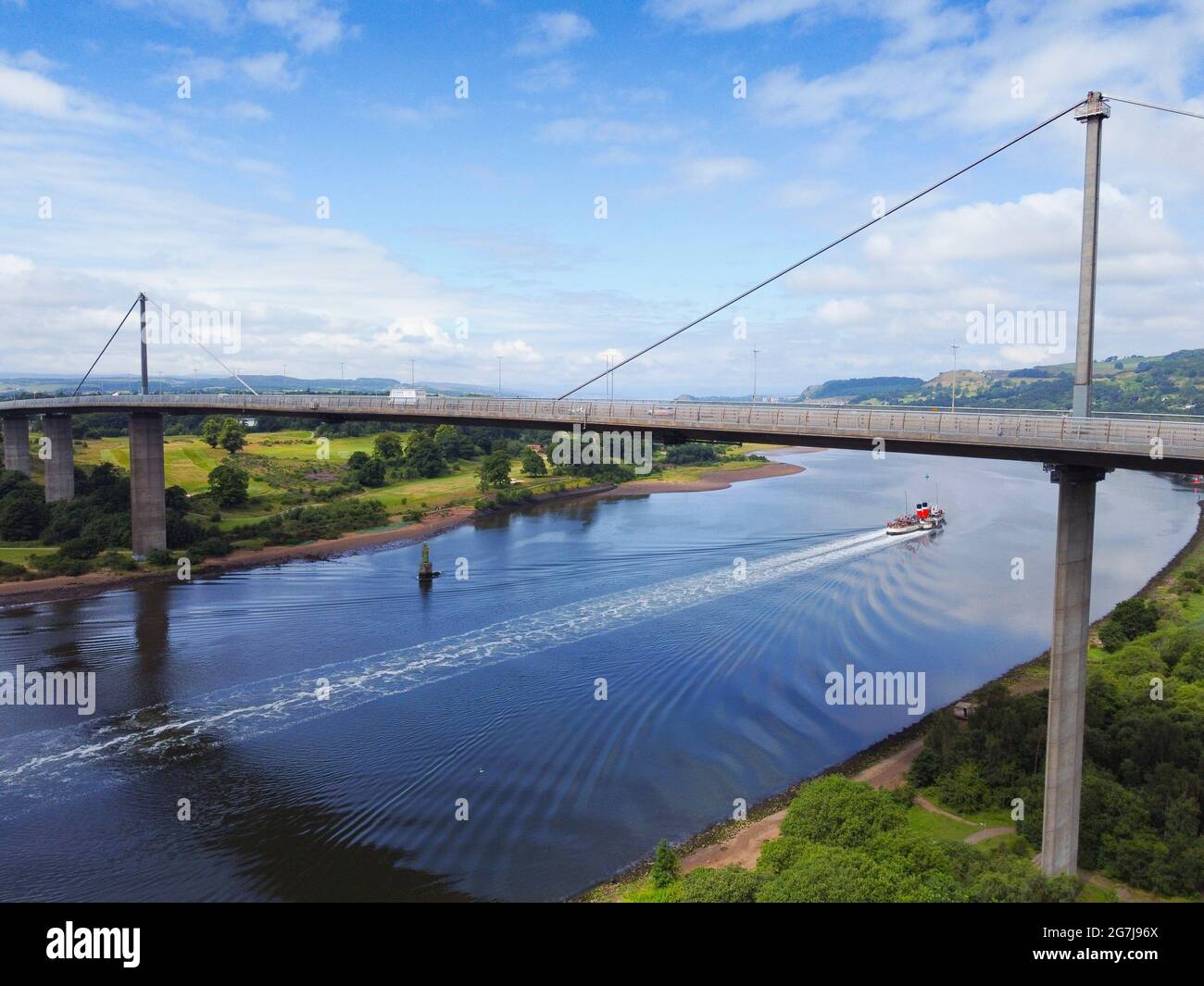 Last sea going paddle steamer Waverley sailing down the River Clyde under the Erskine Bridge on a summer cruise to Scottish Lochs, Erskine, Scotland, Stock Photo