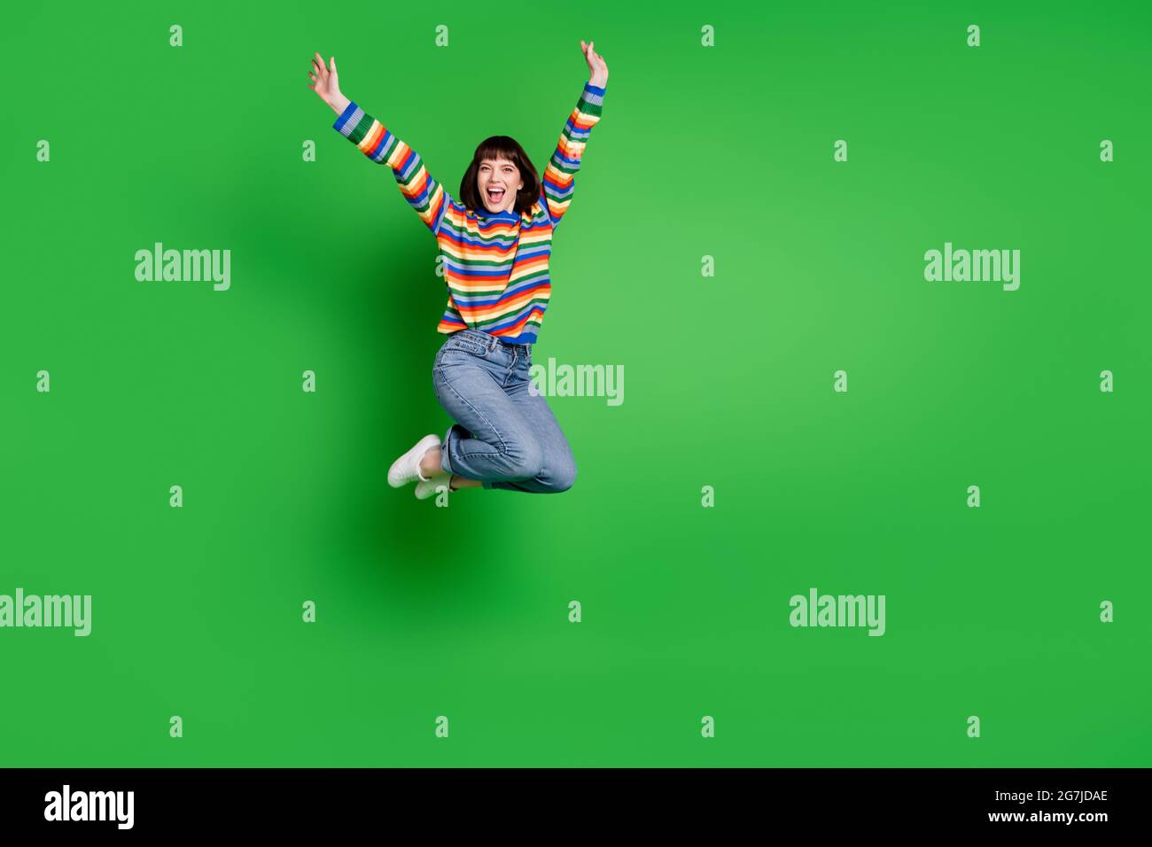Full length photo excited lucky young lady dressed colorful pullover ...