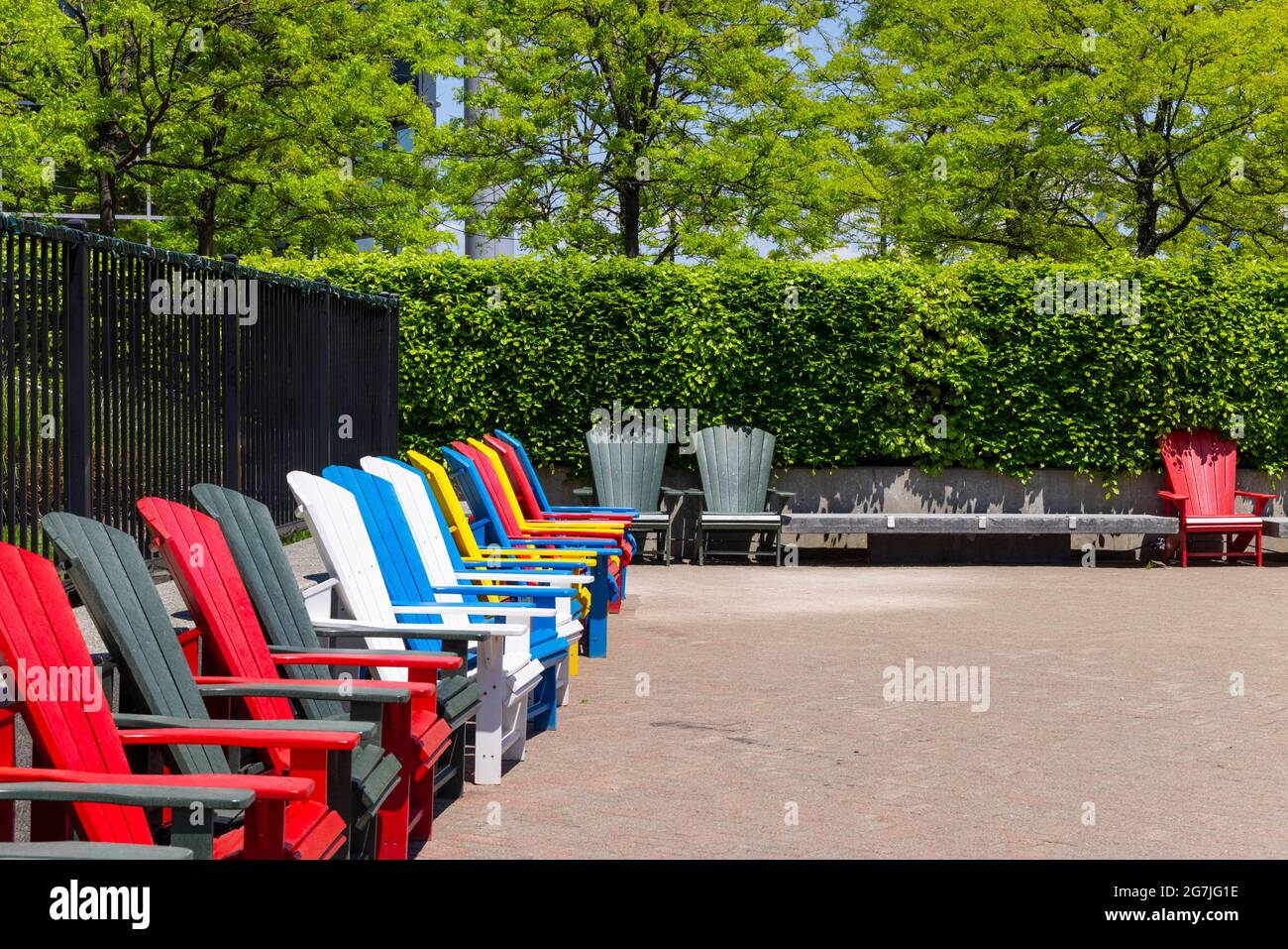 Colorful deck chairs placed on the Hudson River Waterfront Walkway at