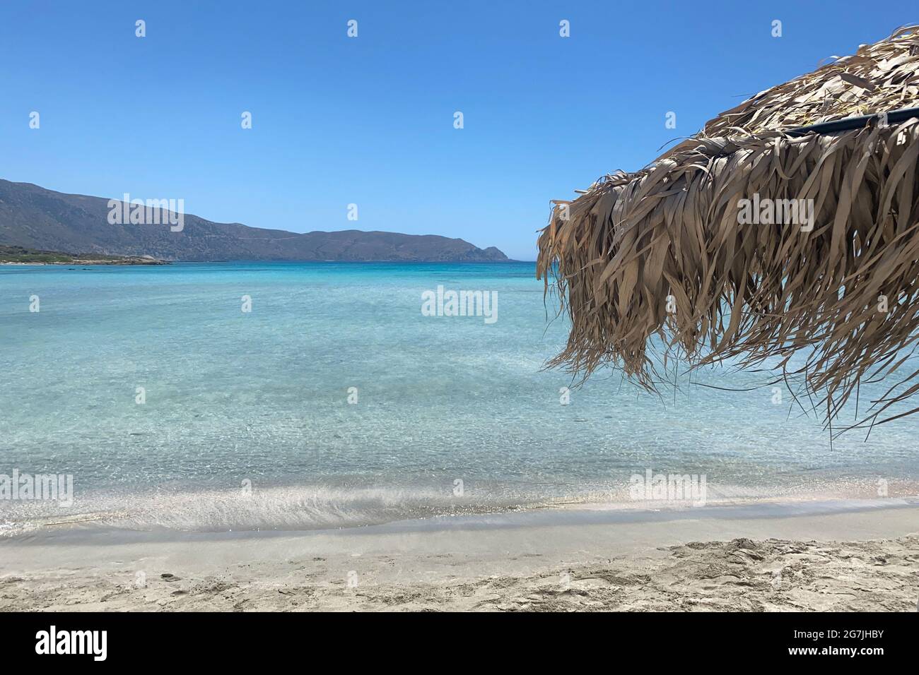 Parasol on Elafonissi Beach on the Greek island of Crete Stock Photo