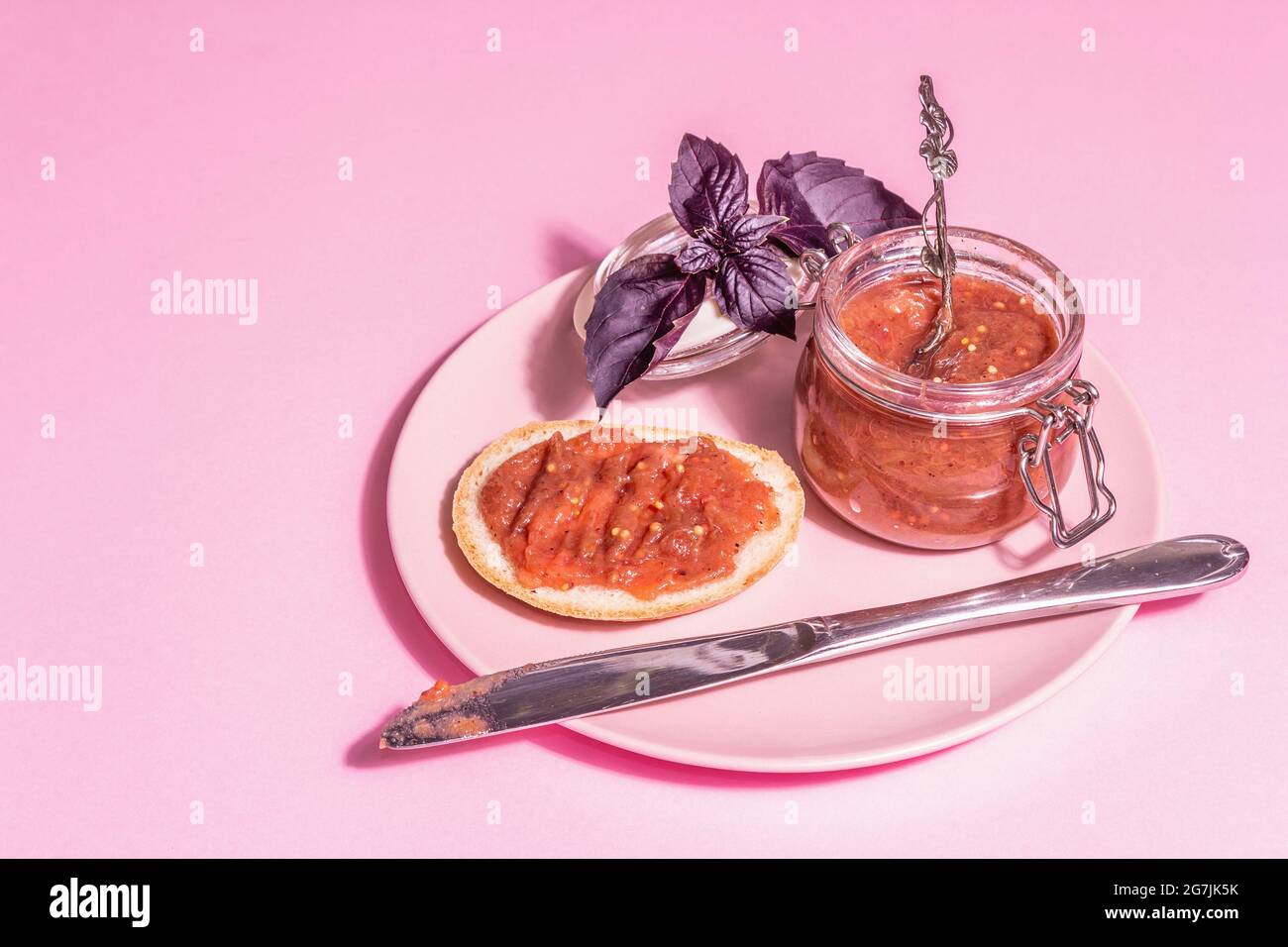 Chutney from rhubarb. Delicious food, traditional seasonal sauce. Pastel  pink background, modern hard light, dark shadow, copy space Stock Photo -  Alamy