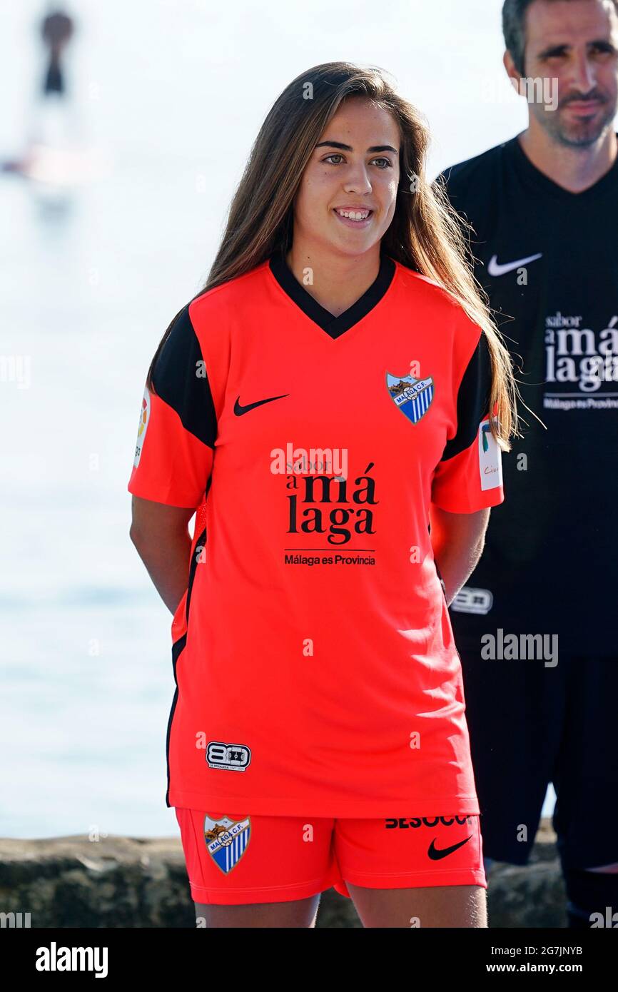 Malaga, Spain. 14th July, 2021. Football player Marina Galvez wears the  second jersey of Malaga CF during the Presentation of the official Malaga  CF uniforms for the 2021/2022 season at Baños del