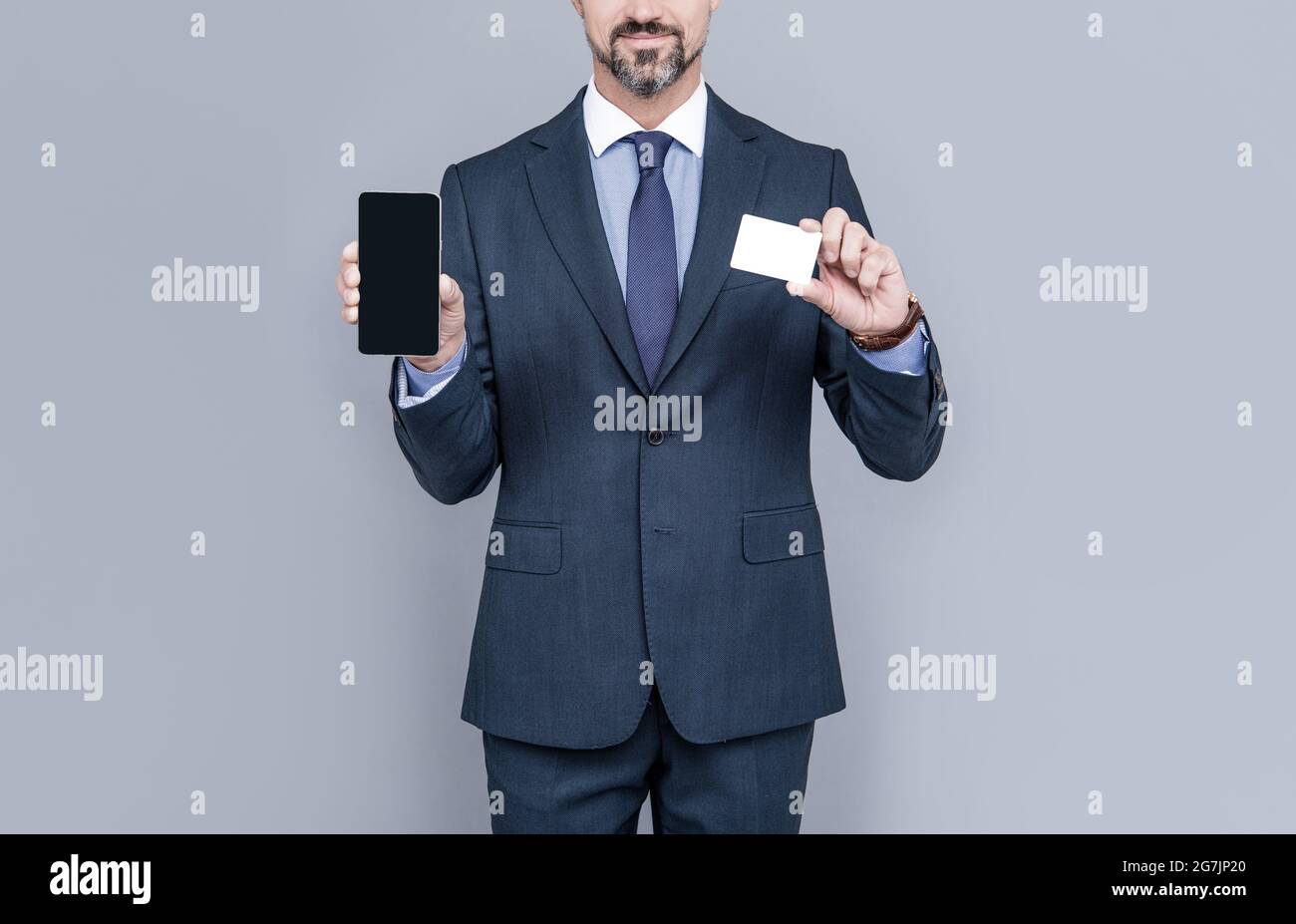 cyber monday. manager showing smartphone. man pay in online banking. online money. credit or debit card. businessman hold business card. fast phone pa Stock Photo