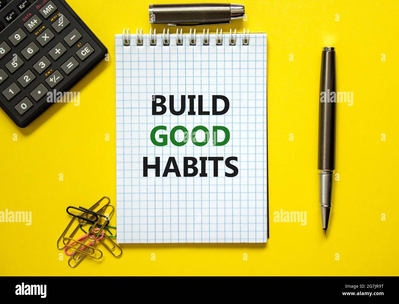 Build good habits symbol. Words 'Build good habits' on white note ...