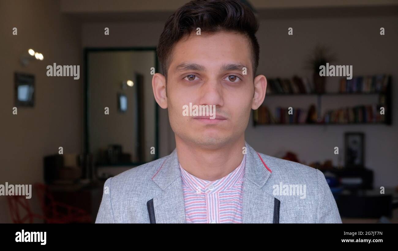 Eyes young indian man thinking hi-res stock photography and images - Alamy