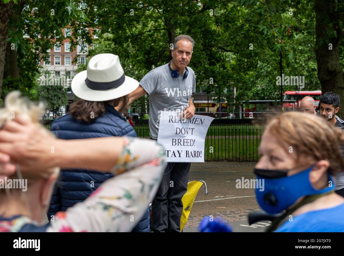 London. UK- 07.11.2021. A man speaking and debating with a  crowd of people in Speakers' Corner. Stock Photo