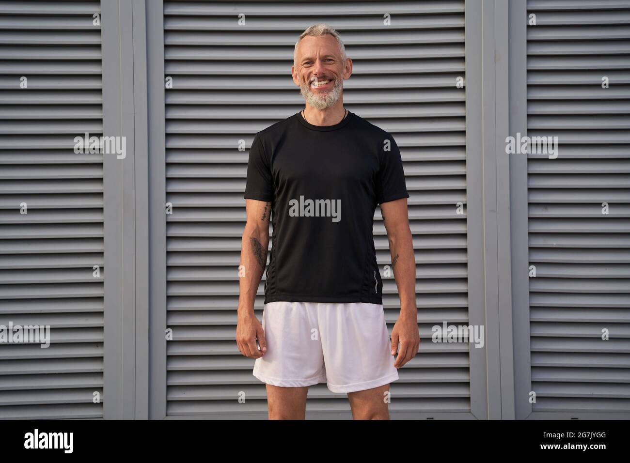 Smiling athletic male practicing hi-res stock photography and images ...