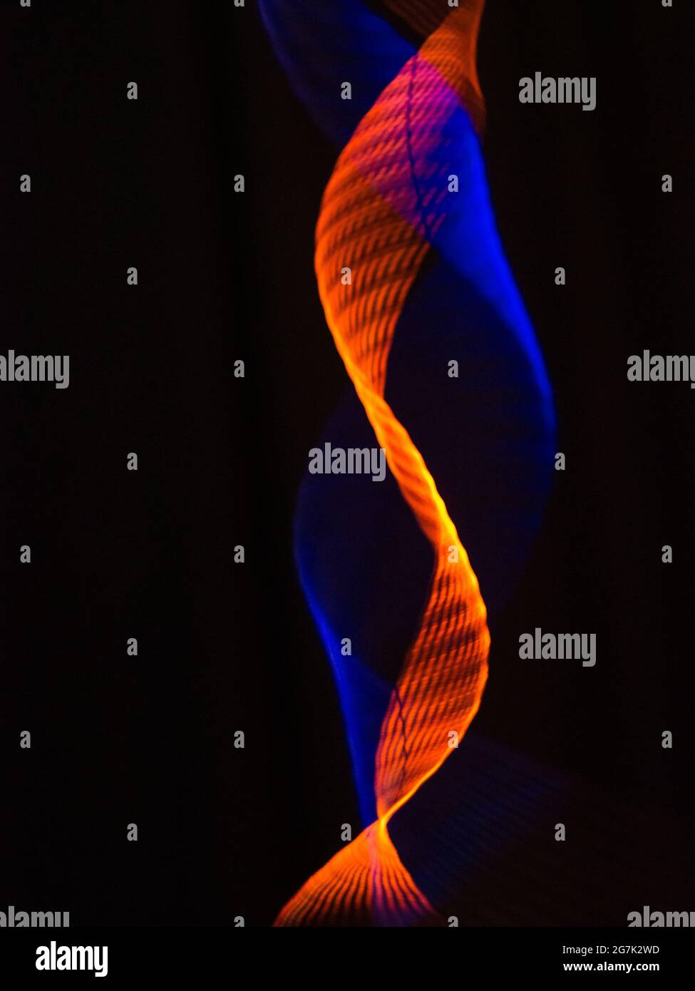 Abstract orange and blue winding lines on a black background Stock ...