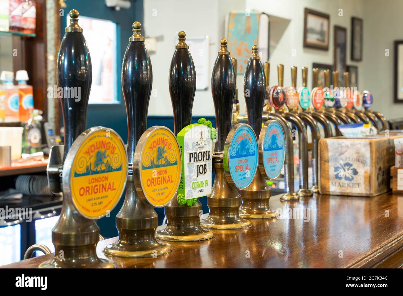 close-up view of beer pumps handle inside a Greenwich Pub cutty Sark England UK coaches & horses Stock Photo